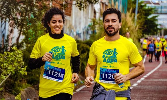 Two athletes participating in a marathon, showing determination and joy.